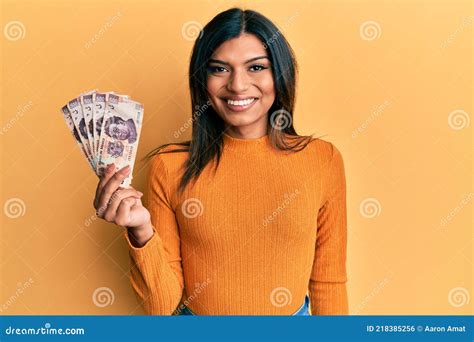 Young Latin Transsexual Transgender Woman Holding 500 Mexican Pesos