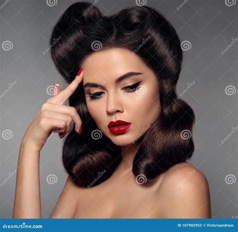 Nostalgia Pin Up Girl With Red Lips Makeup And Retro Curls Hair Royalty Free Stock Image