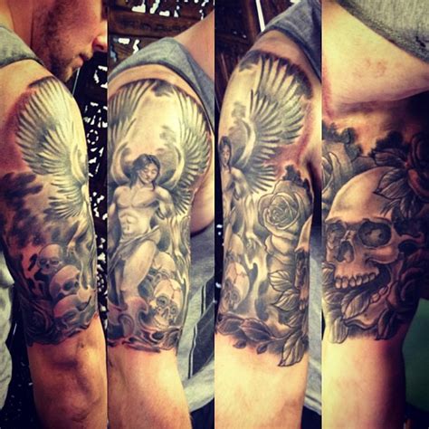 Half Sleeve Grey Ink Winged Angel And Skull Tattoo