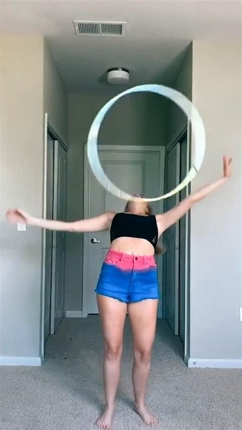Girl Takes Couple Of Attempts Before Successfully Performing Hula Hoop Trick Jukin Media Inc