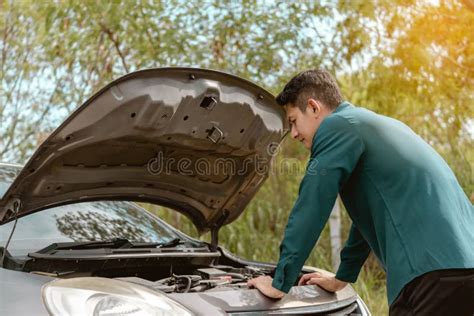 Man Open Car Hood For Repair As Maintenance Service Man Trying To