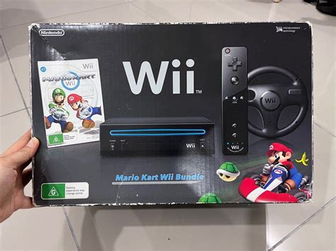 Wii Console Black With Original Games Cd Mario Kart And Wii Party