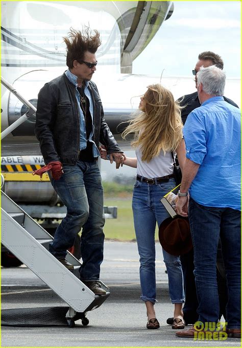 Johnny Depp And Amber Heard Hold Hands For Australian Arrival Photo