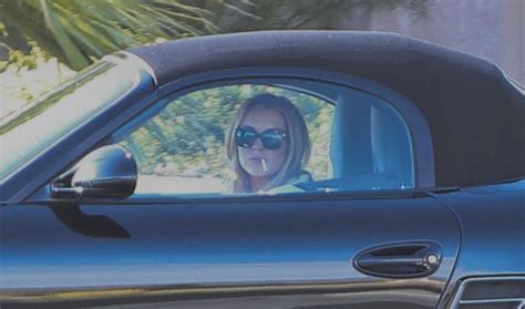 Lindsay Lohan Smokes While Driving A Porsche Autoevolution