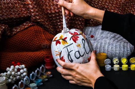 Diy Do It Yourself Woman Paints Thanksgiving Decorations On Orange