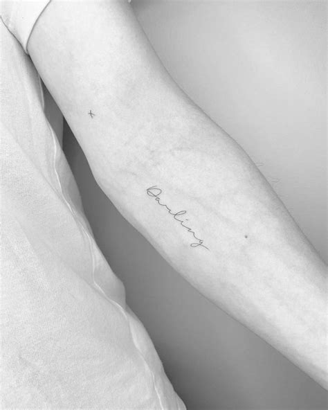 Darling Lettering Tattoo On The Inner Forearm