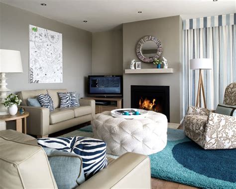 A lavender tufted divan, crystal chandelier and a plaster ceiling medallion all makes up a classical space giving life to the grey sofa and walls. Gray And Beige Living Room Design Ideas & Remodel Pictures ...