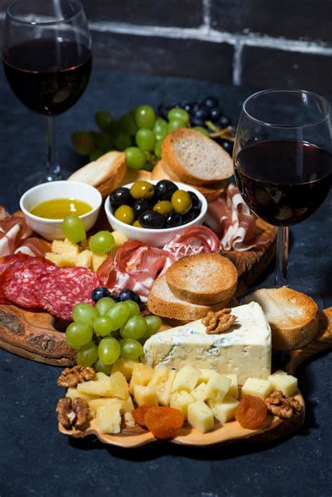 Cheese Platter Bread Fruit And Cold Cuts To Wine Vertical Closeup