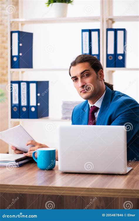 Young Male Employee Working In The Office Stock Photo Image Of