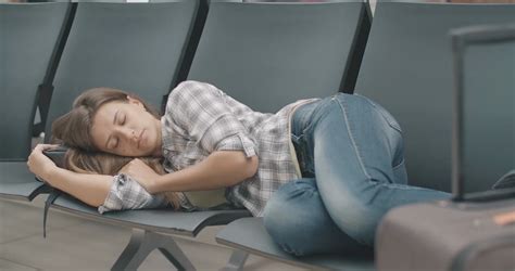 Tired Woman Resting In Airport Waiting Area Stock Footage Sbv 338643357 Storyblocks