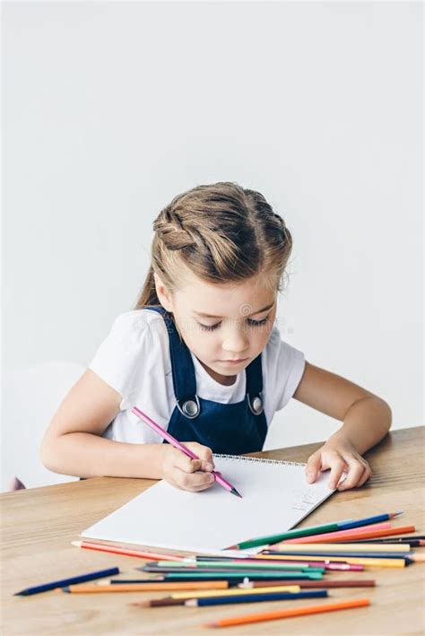 Cute Little Child Drawing With Color Pencils Stock Photo Image Of