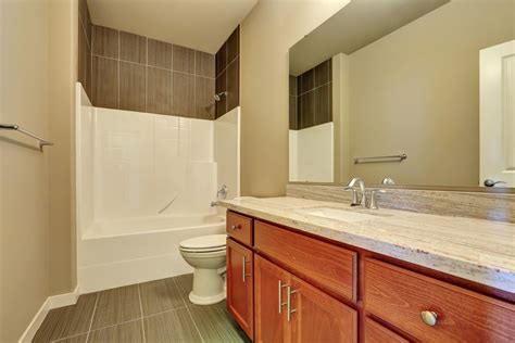Fiberglass shower floors usually have soap and other residues on them. Fiberglass tub shower with tile surround above matching ...