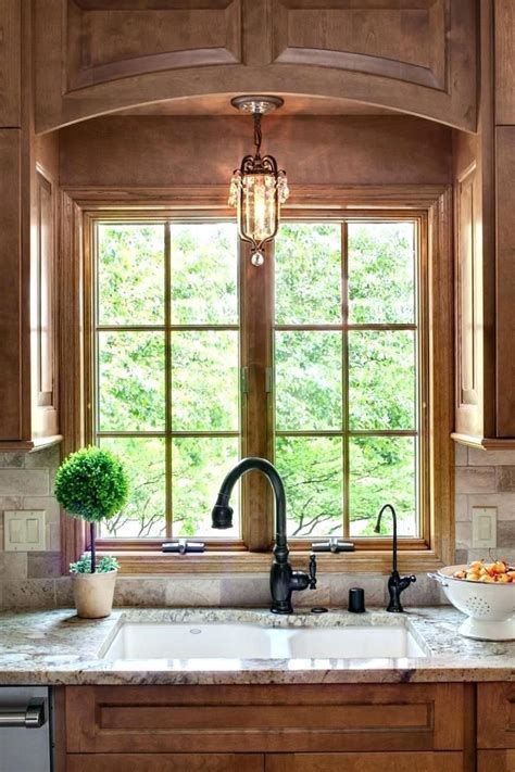 Flush mount lighting and recessed fixtures take advantage of the limited available space found above the kitchen sink. Flush Mount Light Over Kitchen Sink - Kitchen Ideas