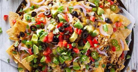 There's just something satisfying about being able to skip the dinnertime fuss by putting all of my ingredients into one dish, baking, and enjoying. Restaurant-Style Loaded Chicken Nachos Recipe | Yummly