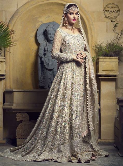 Pakistani dress wholesaler in pakistan. Gold lame gown | Pakistani bridal dresses, Bridal dresses ...