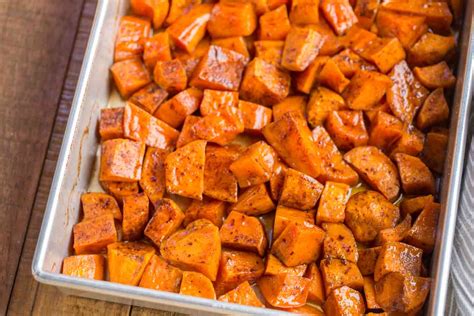 These southern candied yams cooked in a flavorful spiced syrup that will provide a wonderful mouth experience and make you savor the flavors. Candied Yams - Dinner, then Dessert