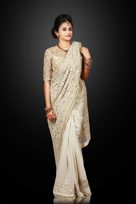 ivory fully embroidered saree with golden highlight hadwork sardosi bead border christian