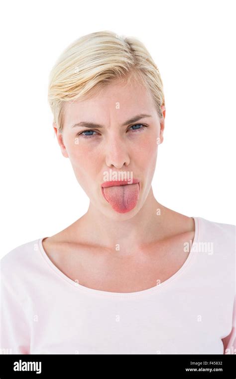 Blonde Woman Sticking Her Tongue Out Stock Photo Alamy
