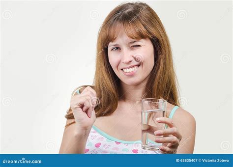 The Girl Holds A Glass With Water In Hand Stock Image Image Of Girl