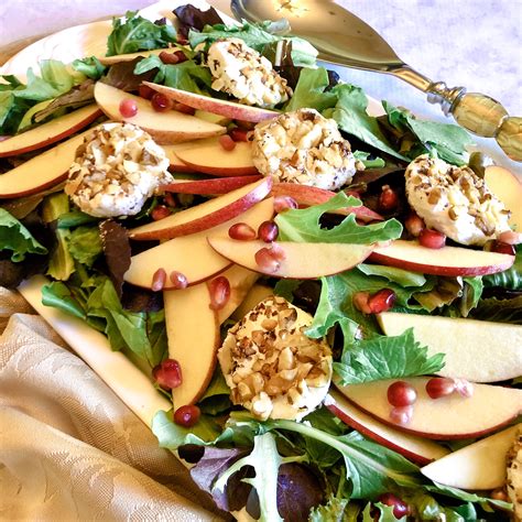 Pomegranate Apple Mixed Greens With Walnut Crusted Goat Cheese Swirls