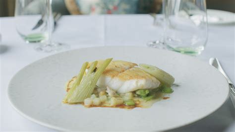 Roast Fillet Of Turbot English Peas Jersey Royal Potatoes And Cockles