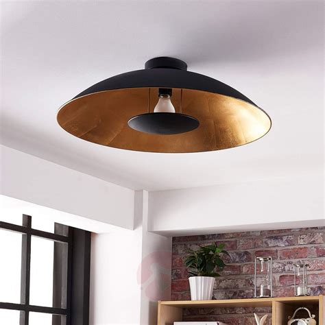 Moins fonctionnels, les luminaires du salon doivent néanmoins produire un espace de confort permettant de se détendre et un espace animé pour les réceptions. Plafonnier LED noir doré Emilienne | Plafonnier ...