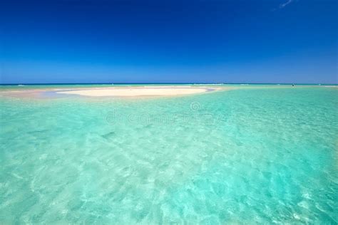 Island With Sandy Beach Blue Lagoon And Clear Water Stock Image