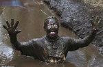 Runners trawl up to their necks in mud for 10K Muddy Trials | Daily ...