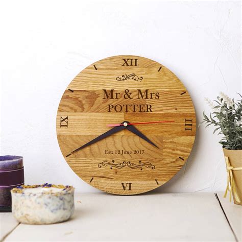 Ferns n petals is here with an exclusive collection of personalised gifts for rakhi such as personalised cushion, personalised mug, personalised photo frame, personalised engraved pen, personalised key ring and personalised bottle lamp, etc. Personalised Handcrafted Wooden Clock By Natural Gift ...