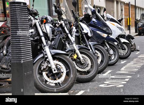 Row Of Parked Motorcycles Stock Photo Alamy