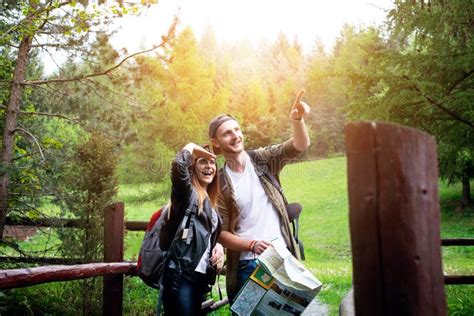 Young Couple Traveling In A Nature Happy People Travel Lifestyle