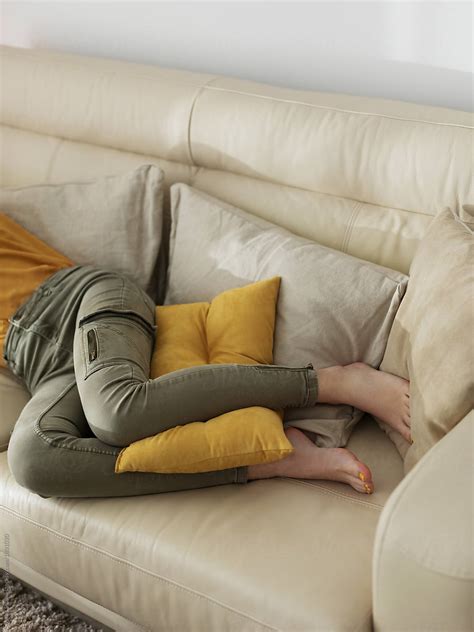 Crop Barefoot Woman Sleeping On Sofa By Milles Studio Sofa Sleeping