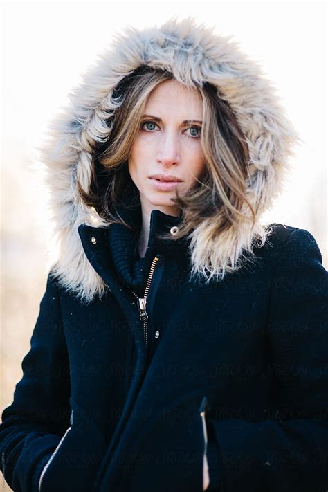 Portrait Of A Beautiful Woman With A Fur Trim Hood Over Her Head By Stocksy Contributor Jakob