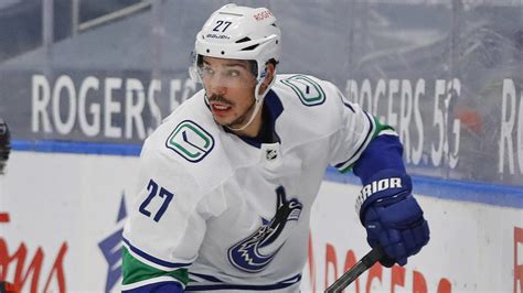 report canucks suspend travis hamonic without pay yardbarker