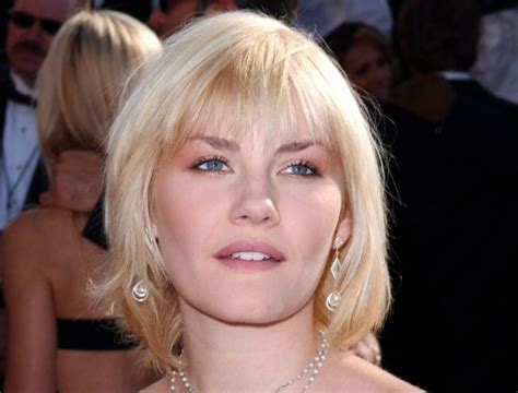 Elisha Cuthbert Hairstyle That Covers The Neckline And Shorter Crispy