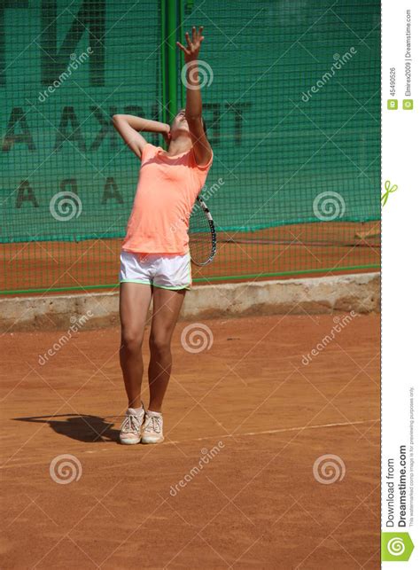 Young Girl Playing Tennis On The Court Stock Photo Image Of