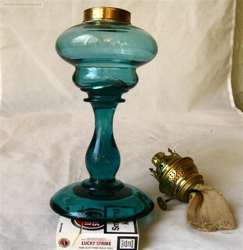 Complete with oil lamp glass. ANTIQUE GERMAN Kosmos Brenner BLUE GLASS KEROSENE OIL LAMP ...
