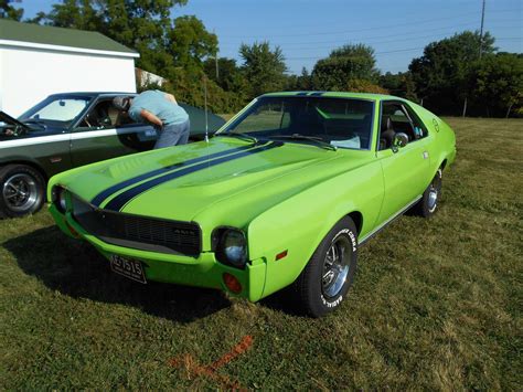 1972 amc javelin amx baja bronze with black stripes greenlight muscle series 21 1/64 diecast model car by greenlight 13230 b. My Big Bad Green 1969 AMX. 390 12.2:1 compression ratio. 340 hp. | Classic cars muscle, Amc javelin