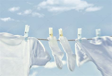 Clothes Hanging On Clothesline Stock Photo By ©sandralise 5660211