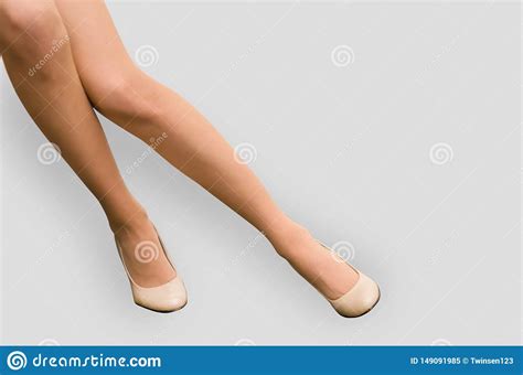 But evaluating beauty and health is not enough. Slender Legs Of A Woman Sitting On A Chair. Sexuality ...