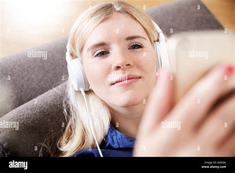 Portrait Of Young Woman Listening Music With Headphones Stock Photo Alamy