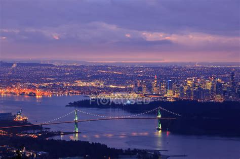 Vancouver Skyline With Lion Gate Bridge And Burrard Inlet At Dawn