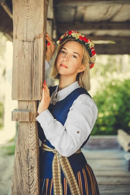 Premium Photo Latvian Woman In Traditional Clothing Posing On Nature