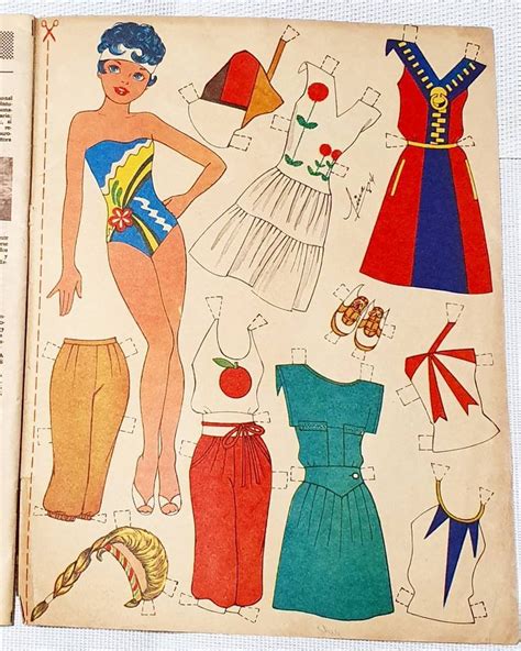 An Old Fashion Book With Paper Dolls And Clothes On It S Pages Including Swimsuits