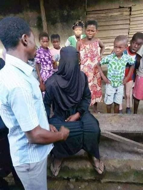 photos nigerian man caught disguised in hijab to have sex with a married woman in her husband s