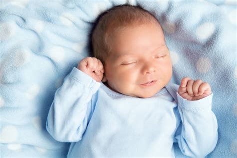 Cute Newborn Baby Boy Smiling