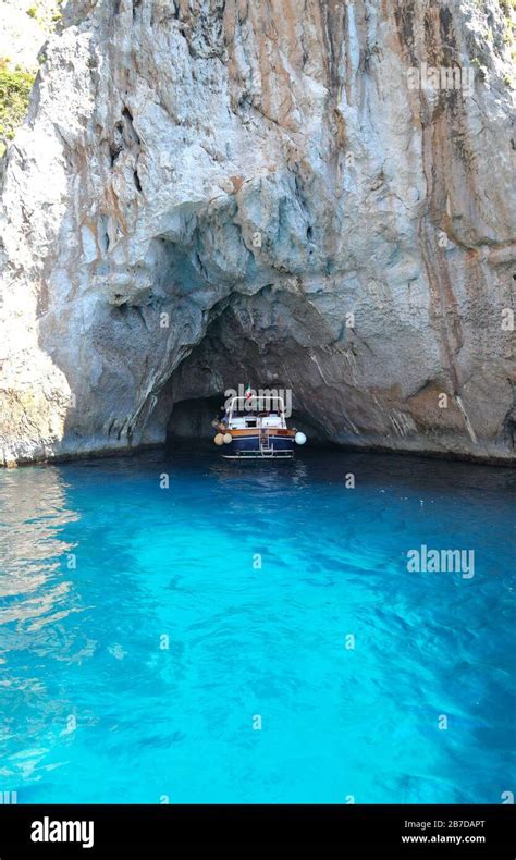 Turquoise Waters And Sea Caves On The Island Of Capri Italy Stock