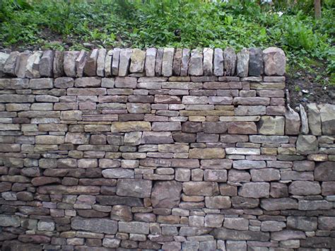 Lovely Dry Stone Wall With Shaped Coping Stones Rock Wall Fencing