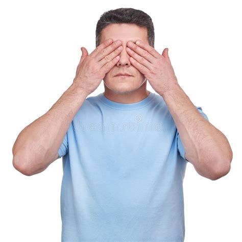 Man With Blue T Shirt Covering His Eyes Two Hands Stock Photo Image