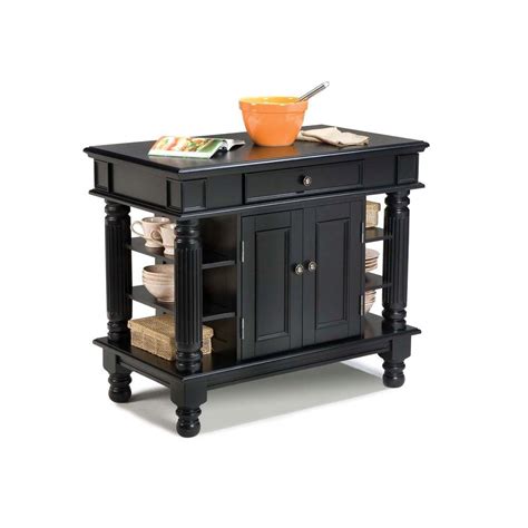 I really didn't care for the original black industrial looking caster wheels that came on the island. Home Styles Americana Black Kitchen Island With Storage ...